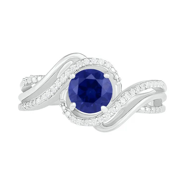 60mm Blue LabCreated Sapphire and 007 CT TW Diamond Beaded Triple Row Bypass Twist Shank Ring in Sterling Silver Goldia Rings 60mm Blue LabCreated Sapphire and 007 CT TW Diamond Beaded Triple Row Bypass Twist Shank Ring in Sterling Silver Goldia Rings