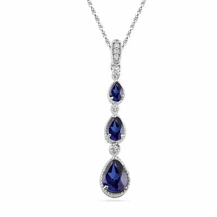 Goldia Earrings PearShaped LabCreated Blue Sapphire and Diamond Accent Drop Pendant in Sterling Silver Goldia Earrings PearShaped LabCreated Blue Sapphire and Diamond Accent Drop Pendant in Sterling Silver