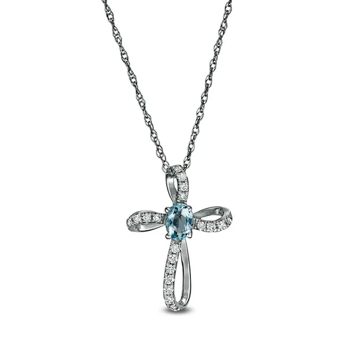 Goldia Necklaces Oval Aquamarine and 01 CT TW Natural Diamond Pinwheel Cross Pendant in 10K White Gold Goldia Necklaces Oval Aquamarine and 01 CT TW Natural Diamond Pinwheel Cross Pendant in 10K White Gold