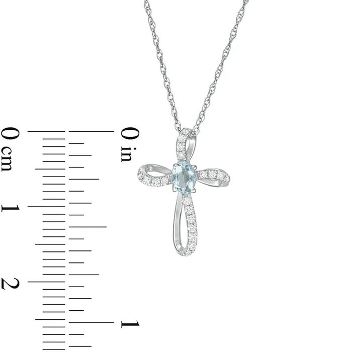 Goldia Necklaces Oval Aquamarine and 01 CT TW Natural Diamond Pinwheel Cross Pendant in 10K White Gold Goldia Necklaces Oval Aquamarine and 01 CT TW Natural Diamond Pinwheel Cross Pendant in 10K White Gold