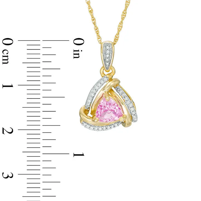 Necklaces Goldia 60mm TrillionCut LabCreated Pink Sapphire and Diamond Accent Swirl Frame Pendant in 10K Yellow Gold Necklaces Goldia 60mm TrillionCut LabCreated Pink Sapphire and Diamond Accent Swirl Frame Pendant in 10K Yellow Gold